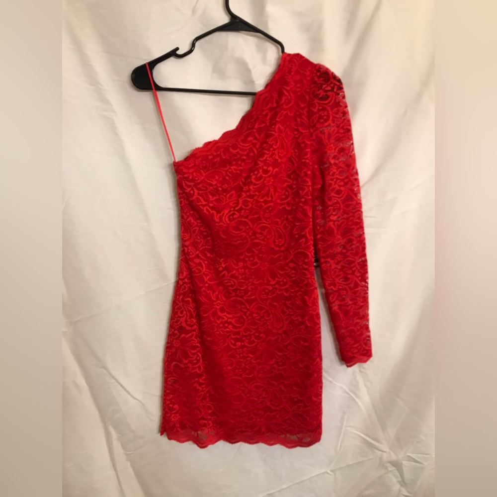 Express dress. Unworn. New with tags attached. Red lace. Pull on. Lined. Size 2.